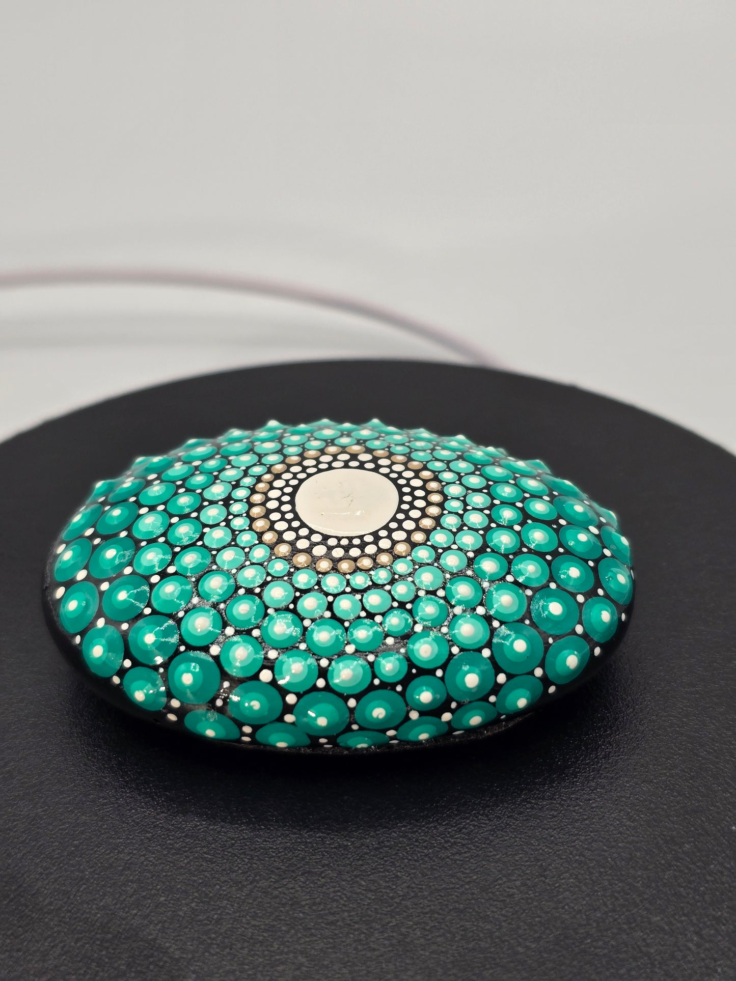 Celina Miller Art - Teal and White Mandala Palm Stone
